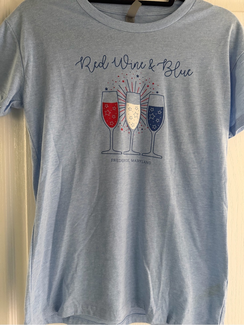 Next Level Apparel Light Blue Graphic Tee with Wine Glasses
Frederick Maryland